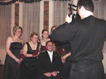 Devin, bridesmaids, and photographer